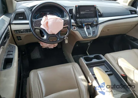 2021 Honda Odyssey Exl z USA, uszkodzony, nr VIN 5FNRL6H77MB023883